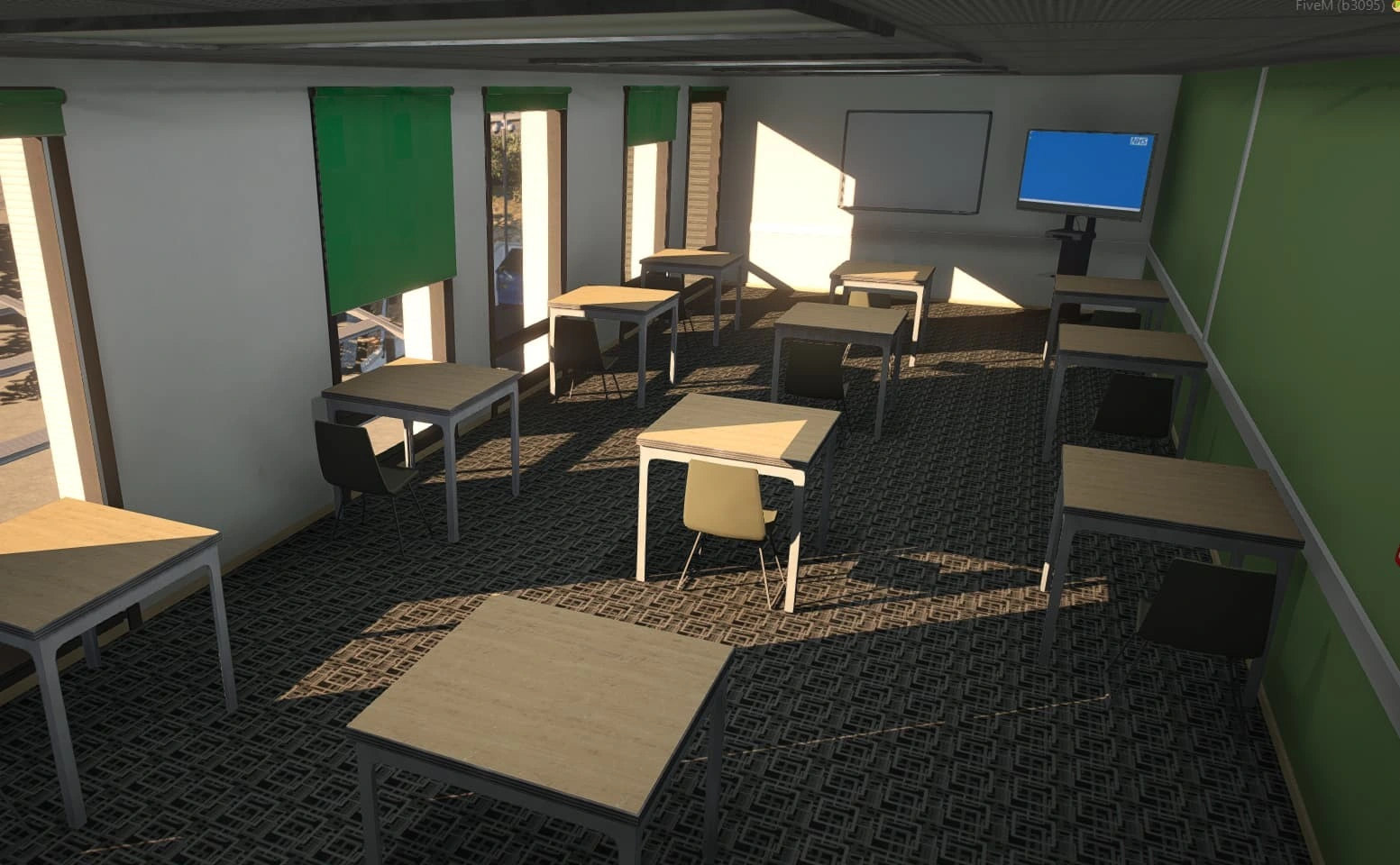 Ambulance Hub training room with desks, green blinds and presentation screen